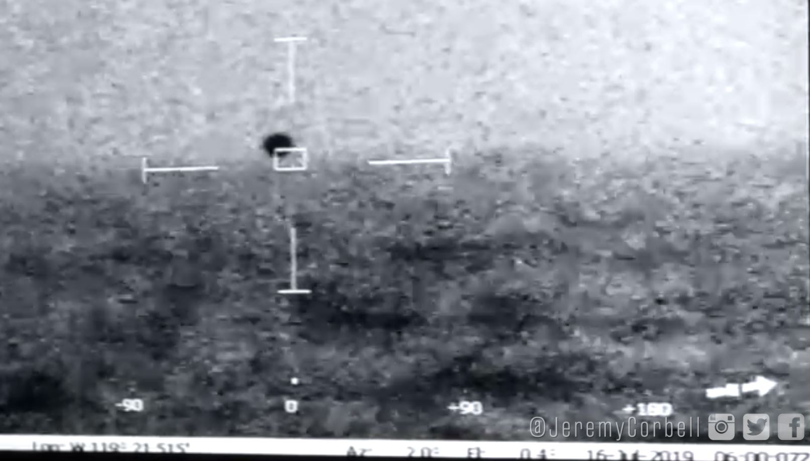 Grainy footage of a UAP is shown.