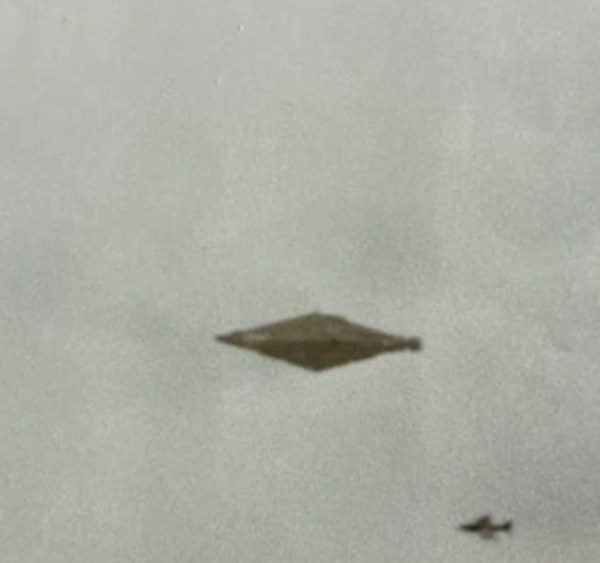 A picture of a UAP shaped like a saucer.