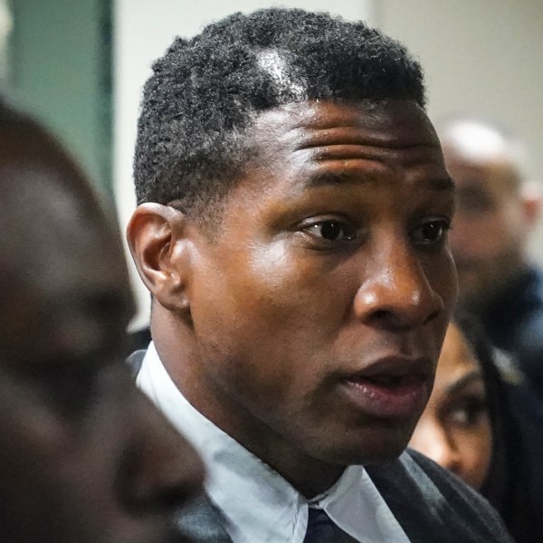 Jonathan Majors, left, returns to court after a lunch break in his domestic assault trial, Tuesday, Dec. 5, 2023, in New York. (AP Photo/Bebeto Matthews)