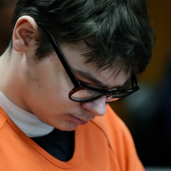 FILE - Ethan Crumbley sits in court listening to victim impact statements, Friday, Dec. 8, 2023, in Pontiac, Mich. A Michigan teen who was convicted of fatally shooting four students at his high school is appealing his life sentence, his attorneys announced Friday. (AP Photo/Carlos Osorio, Pool, file)