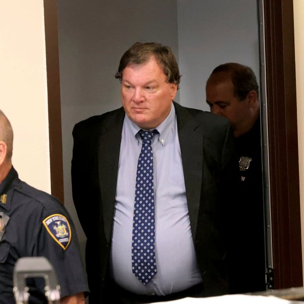 Rex Heuermann, center, charged in the Gilgo Beach killings, arrives in court June 6, 2024.