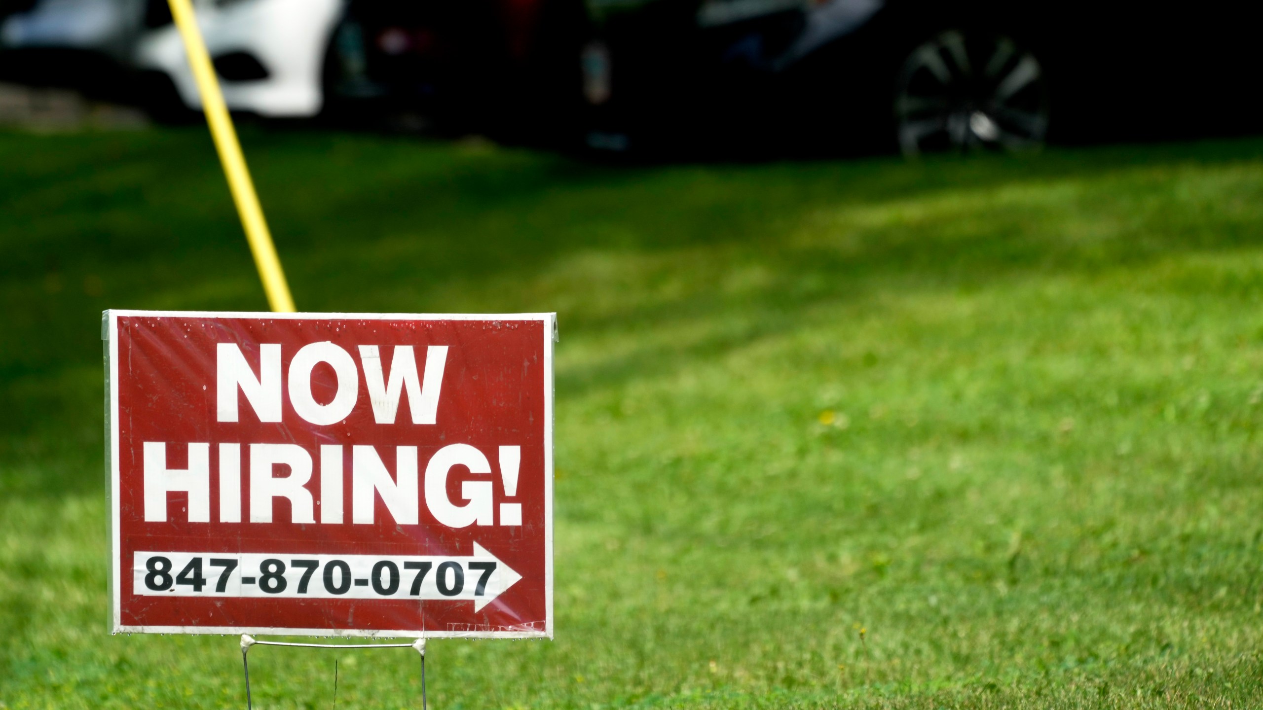 A hiring sign is seen in Wheeling, Ill., Wednesday, July 10, 2024. On Thursday, July 18, 2024, the Labor Department reports on the number of people who applied for unemployment benefits last week. (AP Photo/Nam Y. Huh)
