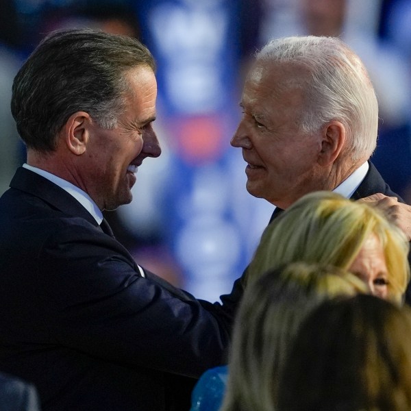 President Biden hugs his son Hunter Biden during the Democratic National Convention Monday, Aug. 19, 2024, in Chicago. (AP Photo/Matt Rourke)