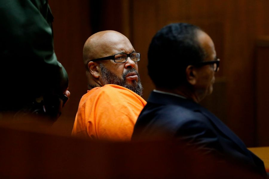 Marion "Suge" Knight, left, shown with his attorney Albert DeBlanc, appears in court pleading no contest to voluntary manslaughter in 2018.