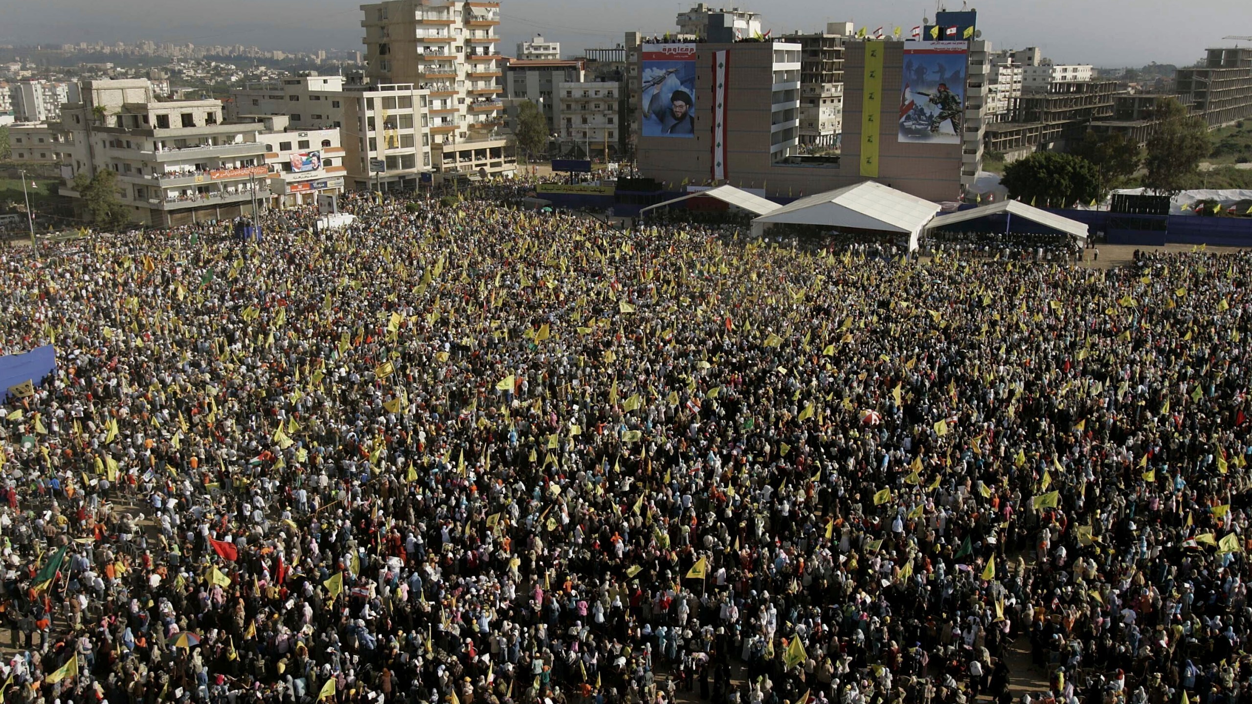 FILE - Hezbollah supporters gather in the southern port city of Tyre, Lebanon, on May 25, 2006, to mark the sixth anniversary of Israel's withdrawal from southern Lebanon after an 18-year occupation. (AP Photo/Hussein Malla, File)
