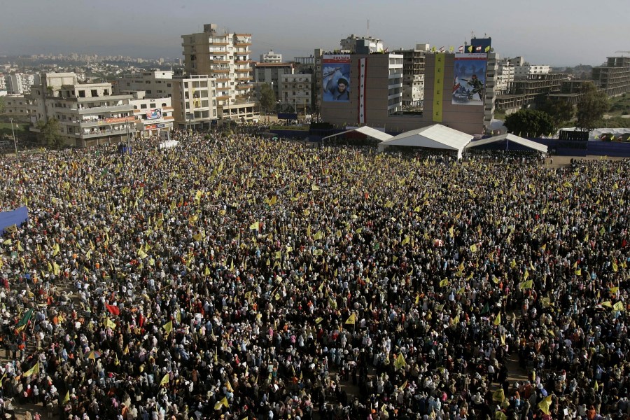 FILE - Hezbollah supporters gather in the southern port city of Tyre, Lebanon, on May 25, 2006, to mark the sixth anniversary of Israel's withdrawal from southern Lebanon after an 18-year occupation. (AP Photo/Hussein Malla, File)