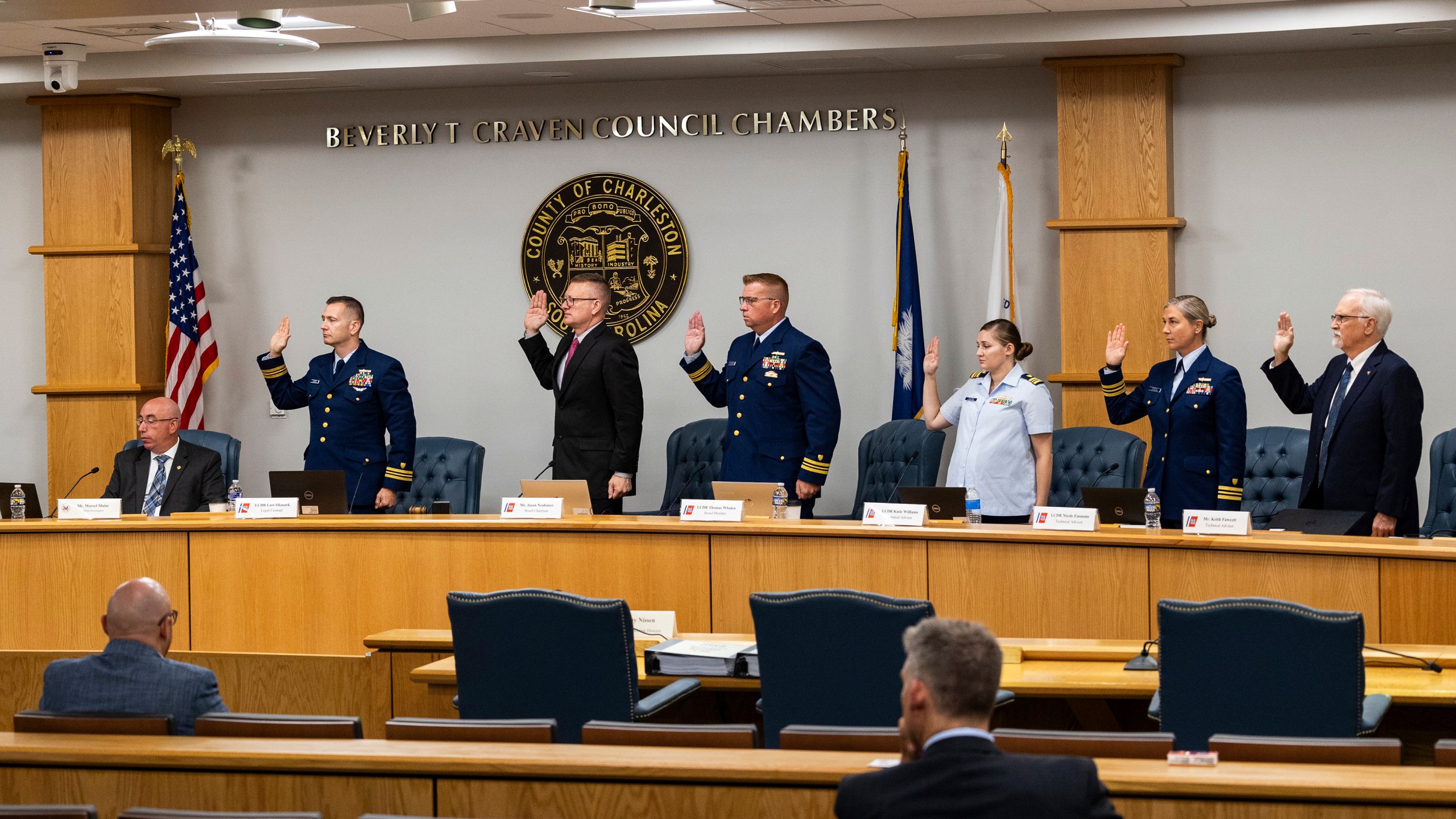 Coast Guard members of the investigative board take an oath inside the Charleston County Council Chambers Sept. 16, 2024