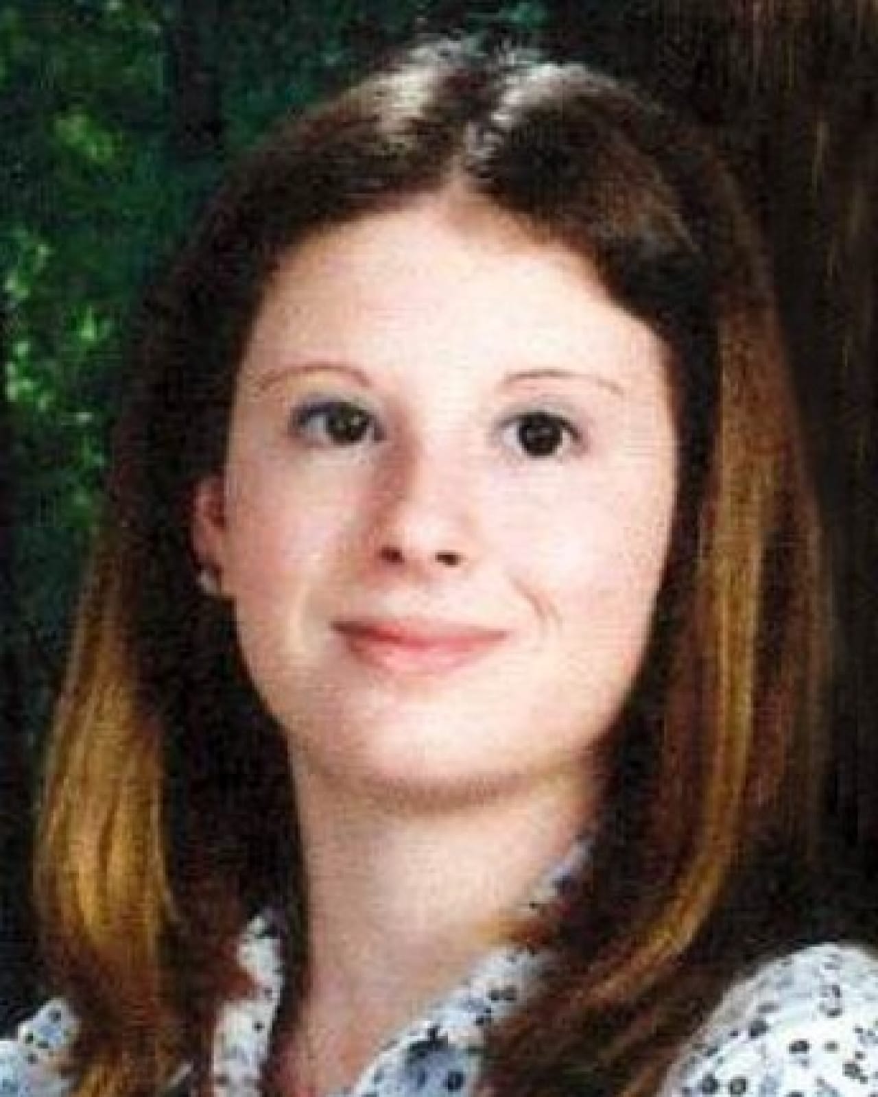 A school photo of a young girl.
