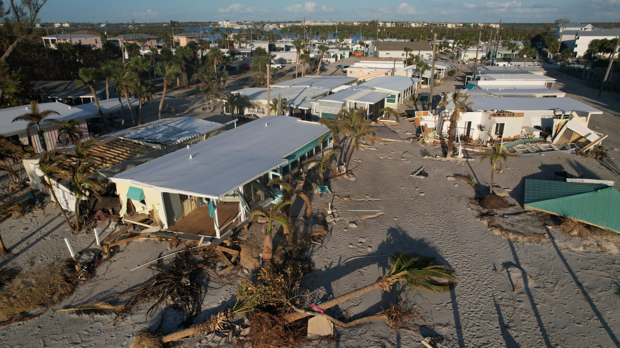 Damage from Hurricane Milton is seen at a mobile home community on Manasota Key, in Englewood, Fla., Sunday, Oct. 13, 2024. (AP Photo/Rebecca Blackwell)
