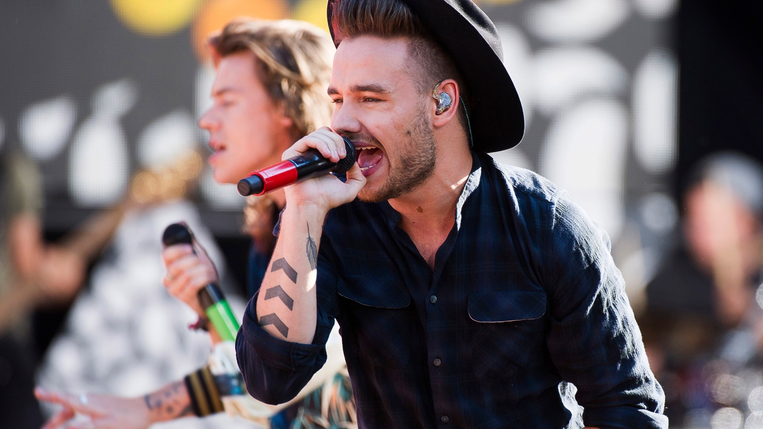 FILE - One Direction members, from right, Liam Payne and Harry Styles perform on ABC's "Good Morning America" at Rumsey Playfield/SummerStage on Tuesday, Aug. 4, 2015, in New York. (Photo by Charles Sykes/Invision/AP, File)