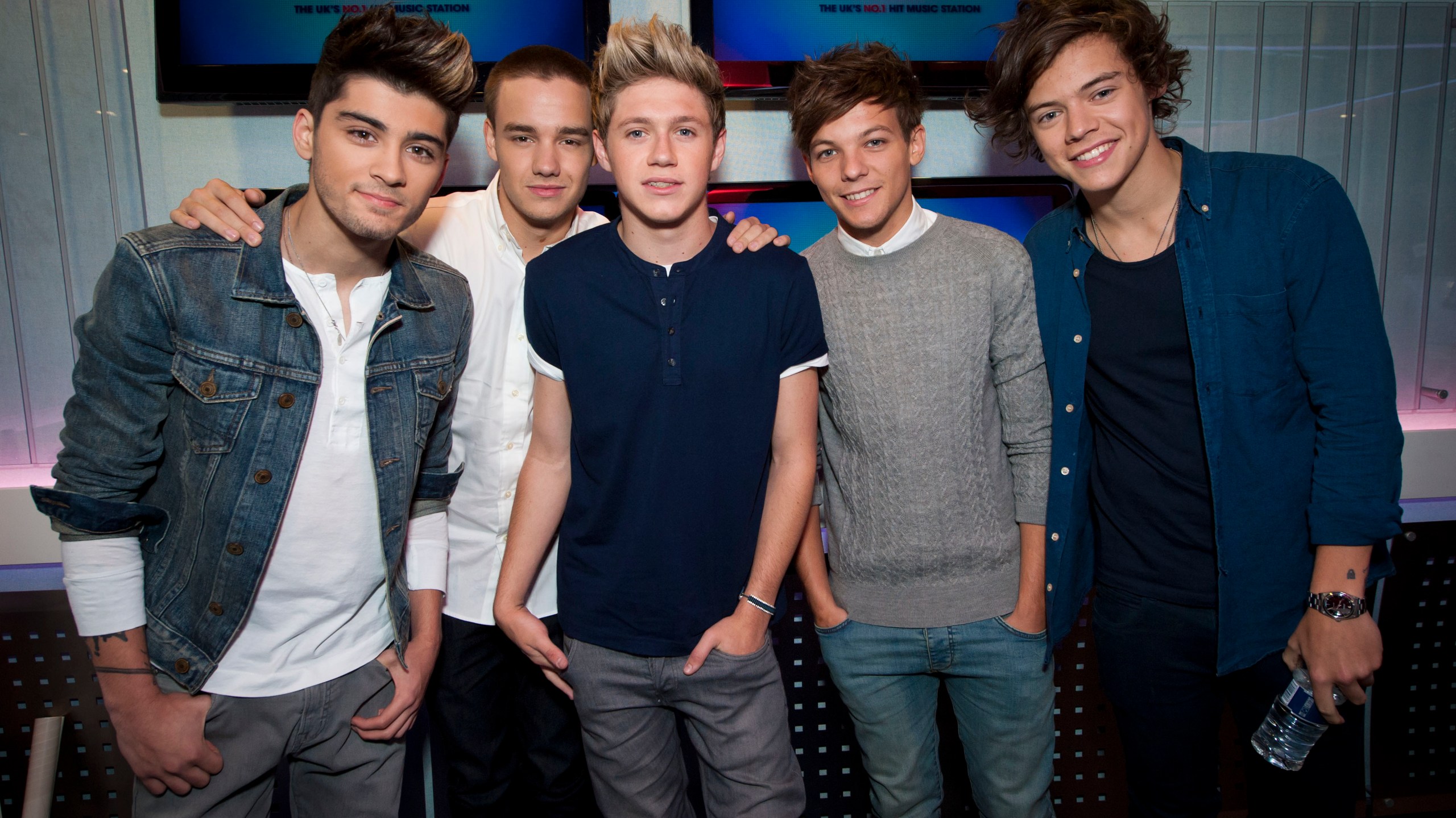 FILE - One Direction's Zayn Malik, from left, Liam Payne, Niall Horan, Louis Tomlinson and Harry Styles pictured during an interview on Capital Breakfast with Dave Berry and Lisa Snowdon, in their studios in Leicester Square, in London, on Friday, Oct. 5, 2012. (Yui Mok/PA via AP, File)