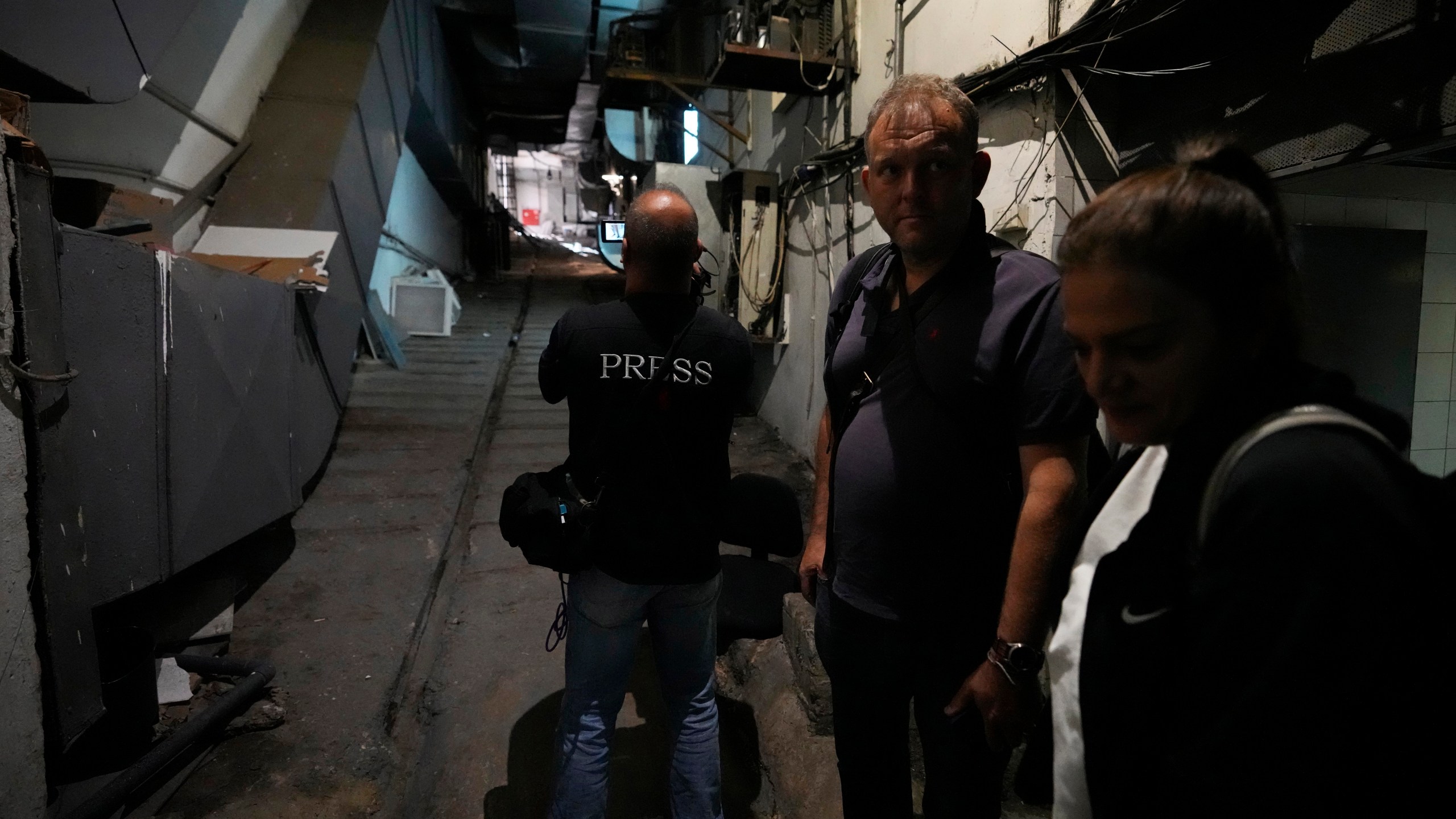 Foreign and local journalists take a tour inside Sahel General Hospital, in Dahiyeh, Beirut, Lebanon, Tuesday, Oct. 22, 2024. (AP Photo/Hassan Ammar)