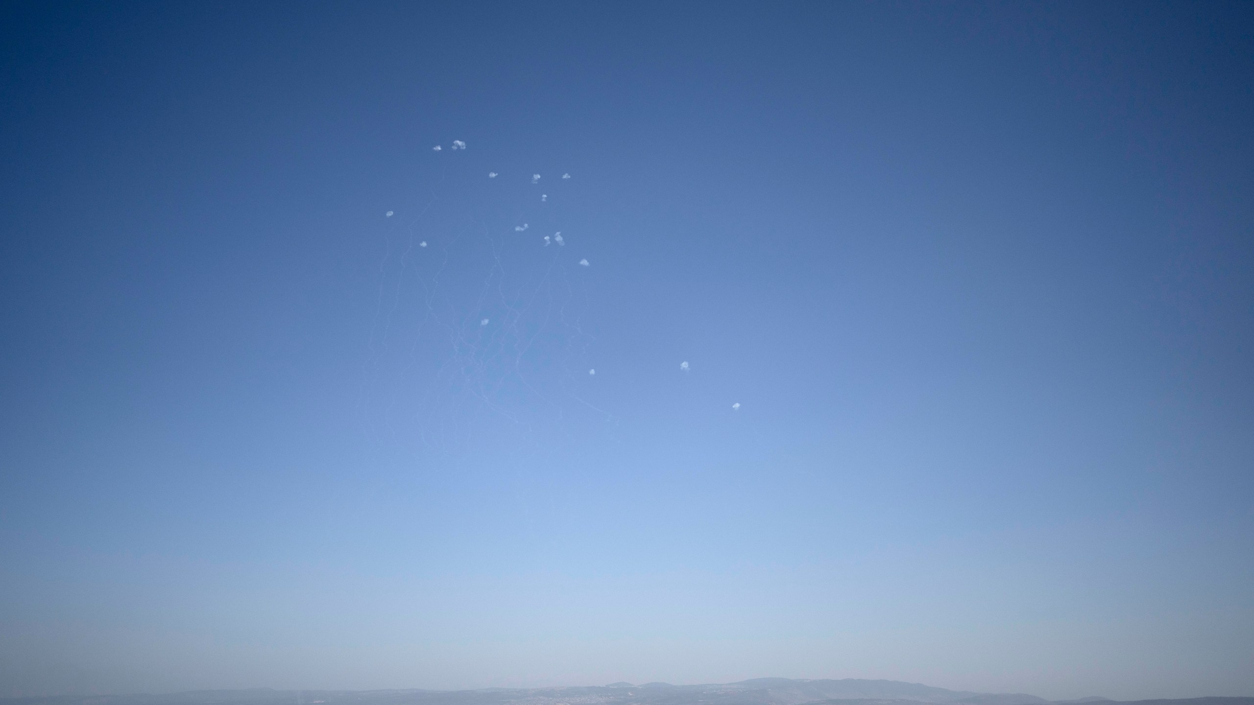 Projectiles fired from Lebanon are intercepted over Haifa, Israel, Wednesday, Oct. 23, 2024. (AP Photo/Maya Alleruzzo)