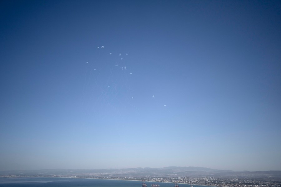 Projectiles fired from Lebanon are intercepted over Haifa, Israel, Wednesday, Oct. 23, 2024. (AP Photo/Maya Alleruzzo)