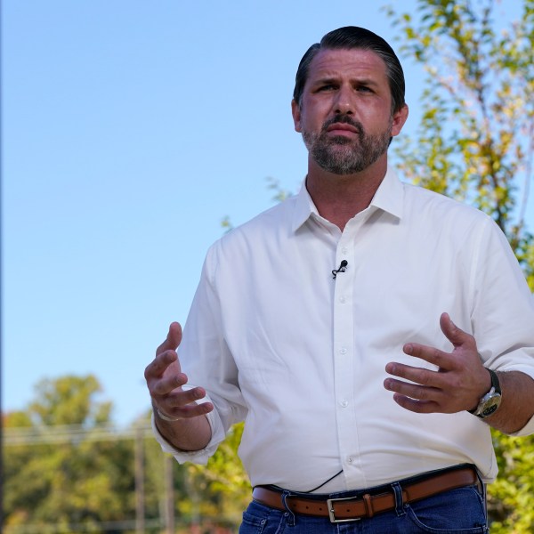 Republican congressional candidate Derrick Anderson gestures during an interview.