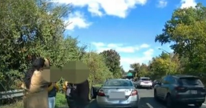 A suspected insurance scam was captured by a driver's dashcam video on the Belt Parkway in Queens on Oct. 16, 2024.