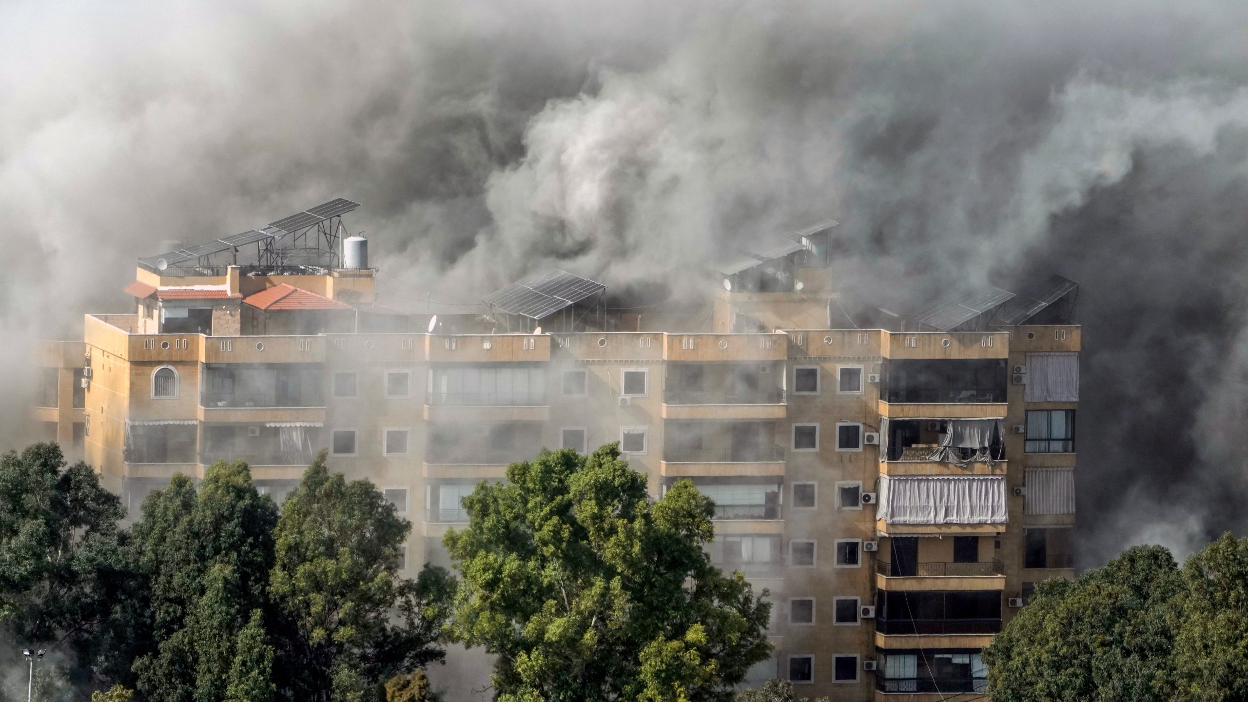 Smoke rises after an Israeli airstrike on Dahiyeh, in the southern suburb of Beirut, Lebanon, Tuesday, Nov. 12, 2024. (AP Photo/Bilal Hussein)