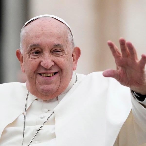 Pope Francis waves as he leaves after his weekly general audience in St. Peter's Square at The Vatican, Wednesday, Nov.20, 2024. (AP Photo/Gregorio Borgia)