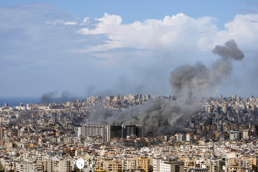 Smoke rises after an Israeli airstrike on Dahiyeh, in the southern suburb of Beirut, Lebanon, Thursday, Nov. 21, 2024. (AP Photo/Bilal Hussein)