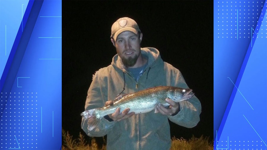 Dustin Kjersem poses with a fish