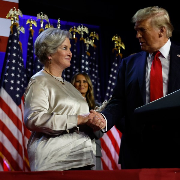 Donald Trump praises his campaign senior advisor Susie Wiles during an election night event at the Palm Beach Convention Center on November 6th in West Palm Beach, Florida.