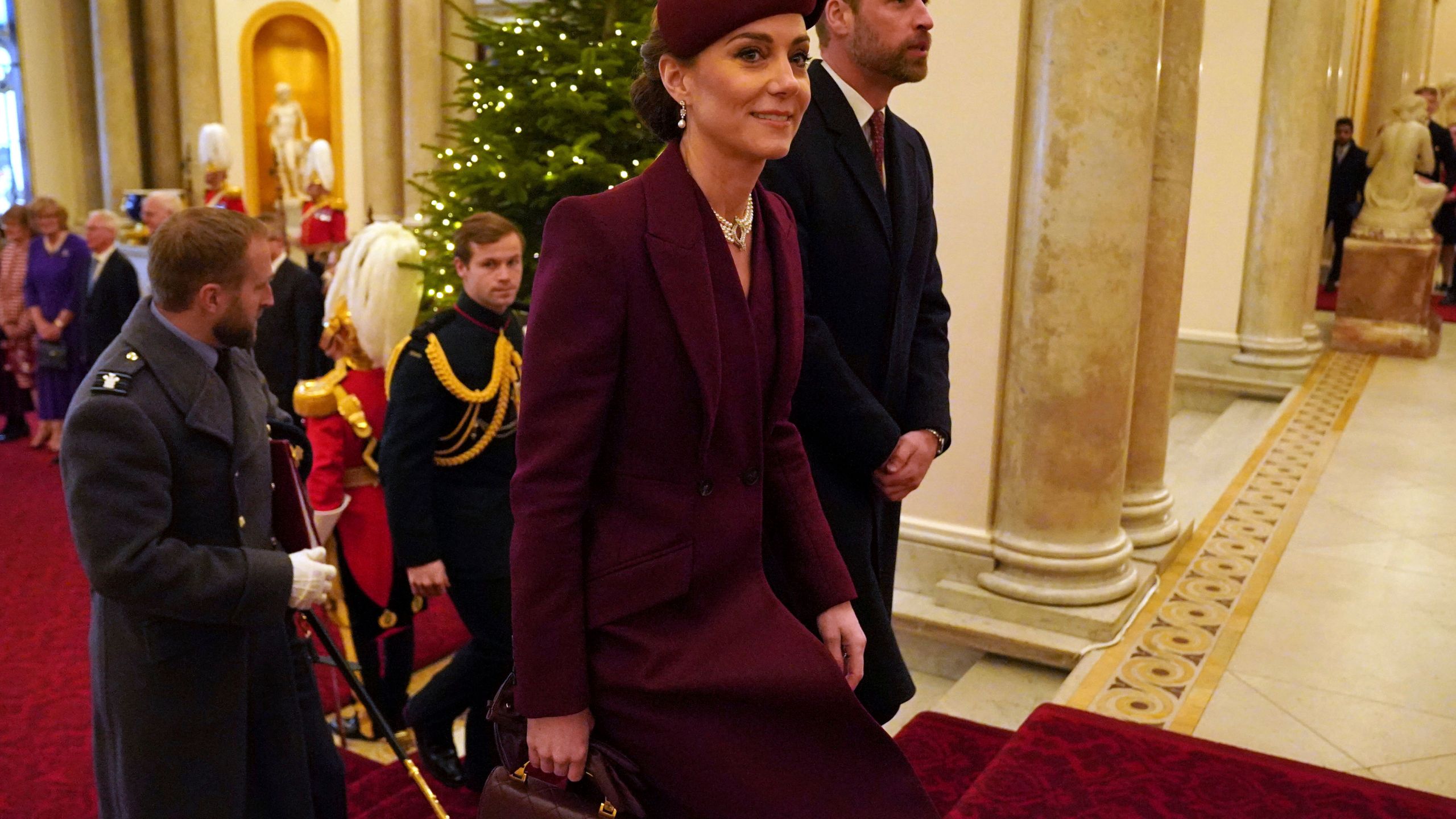 Britain's Prince William and Kate, Princess of Wales arrive at Buckingham Palace, London during the state visit to the UK of the Emir of Qatar Tuesday Dec. 3, 2024. (Jonathan Brady, Pool via AP)