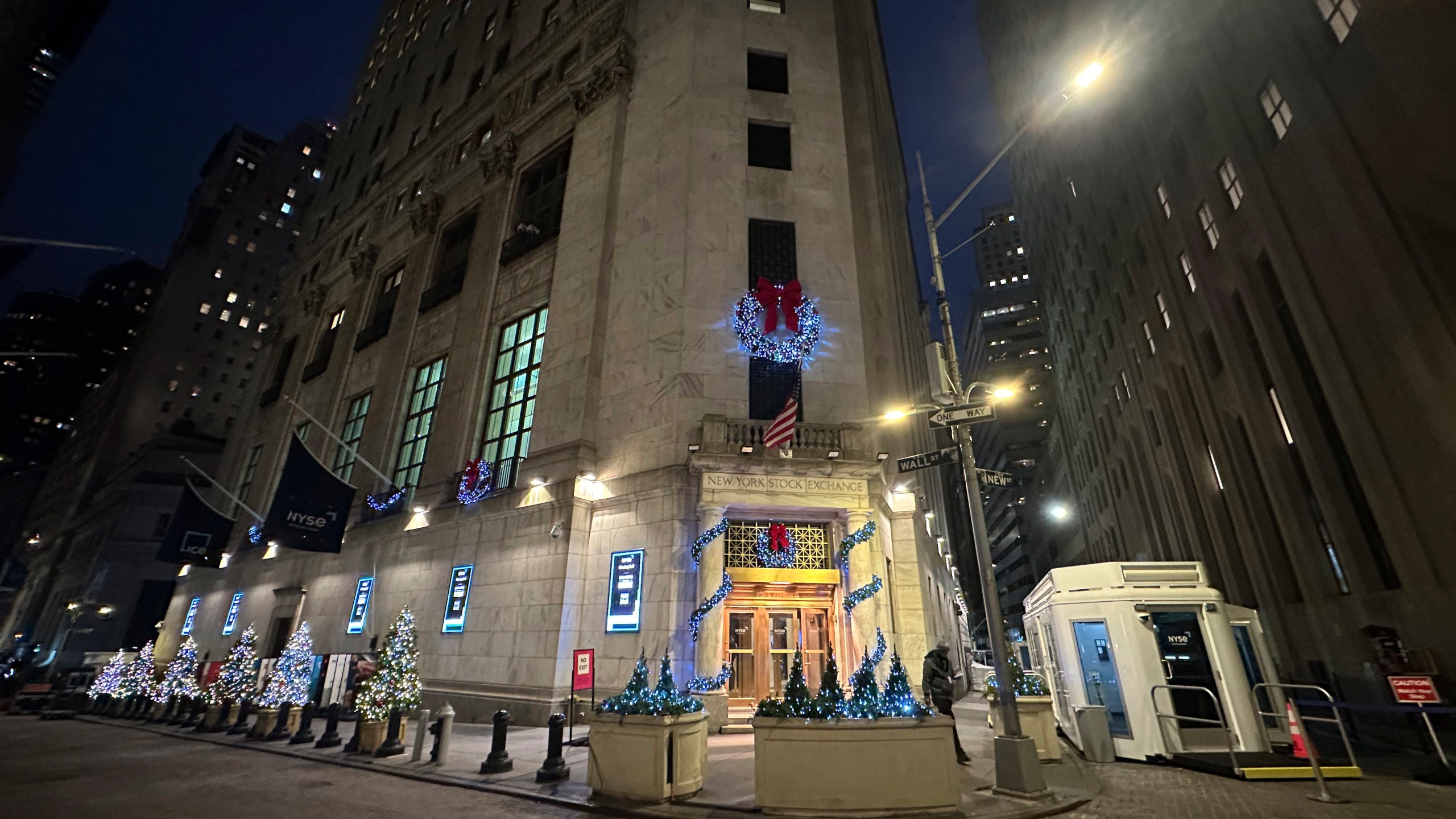 Holiday ornaments adorn the Wall Street side of the New York Stock Exchange in New York's Financial District on Wednesday, Dec. 4, 2024. (AP Photo/Peter Morgan)