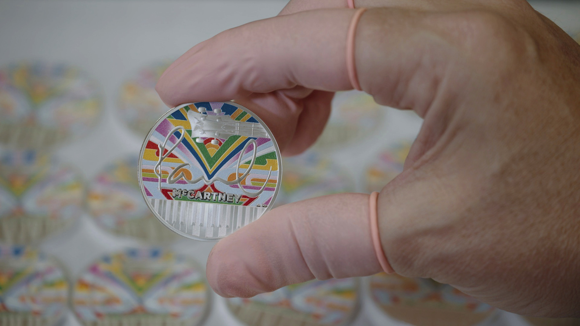 In this photo provided by The Royal Mint on Thursday, Dec. 5, 2024, a view of one of British musician Paul McCartney's new coin on displayed. (The Royal Mint via AP)