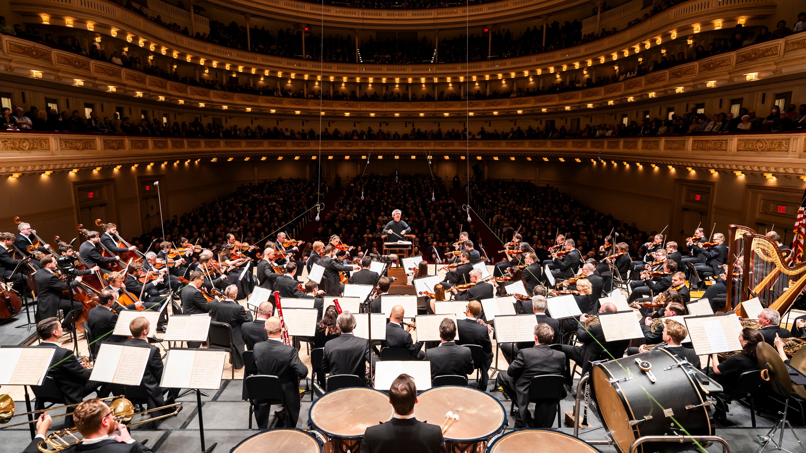 Semyon Bychkov, background center, conducts the Czech Philharmonic at Carnegie Hall in New York on Dec. 3, 2024. (Chris Lee/Carnegie Hall via AP)