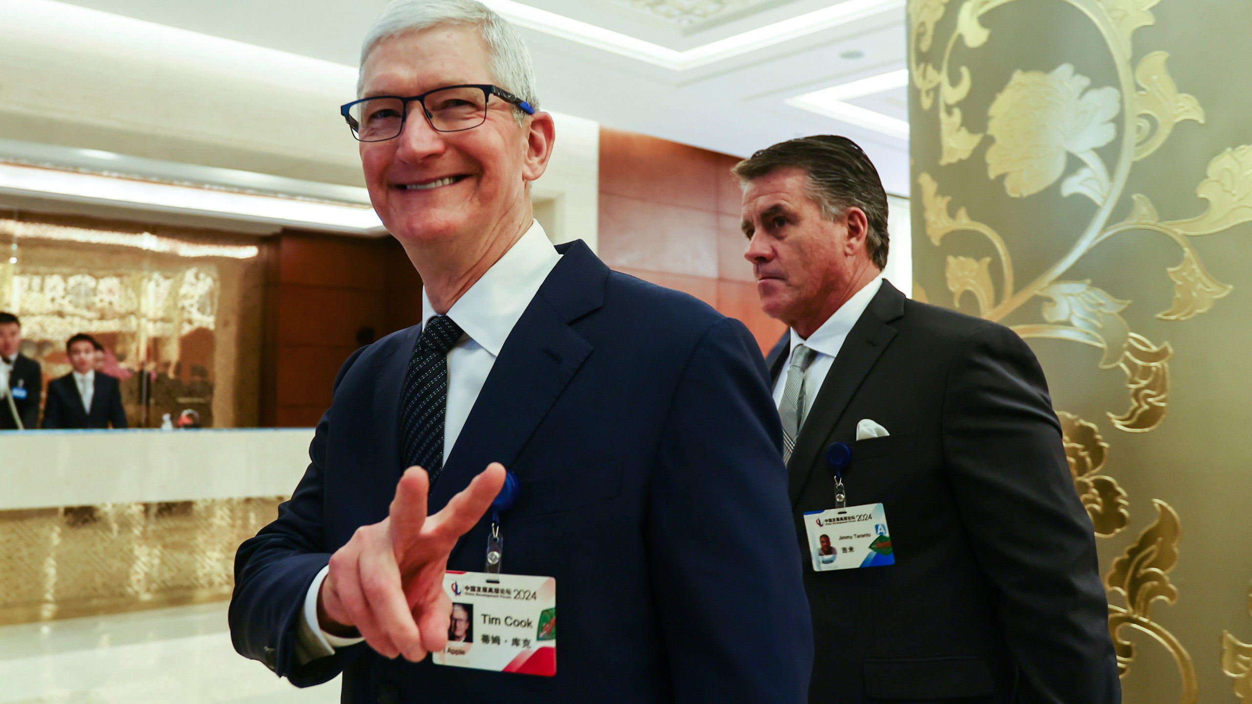 FILE - Apple CEO Tim Cook reacts at the annual meeting of the China Development Forum at the Diaoyutai Guesthouse in Beijing, China, March 24, 2024. (Wu Hao/Pool Photo via AP, File)