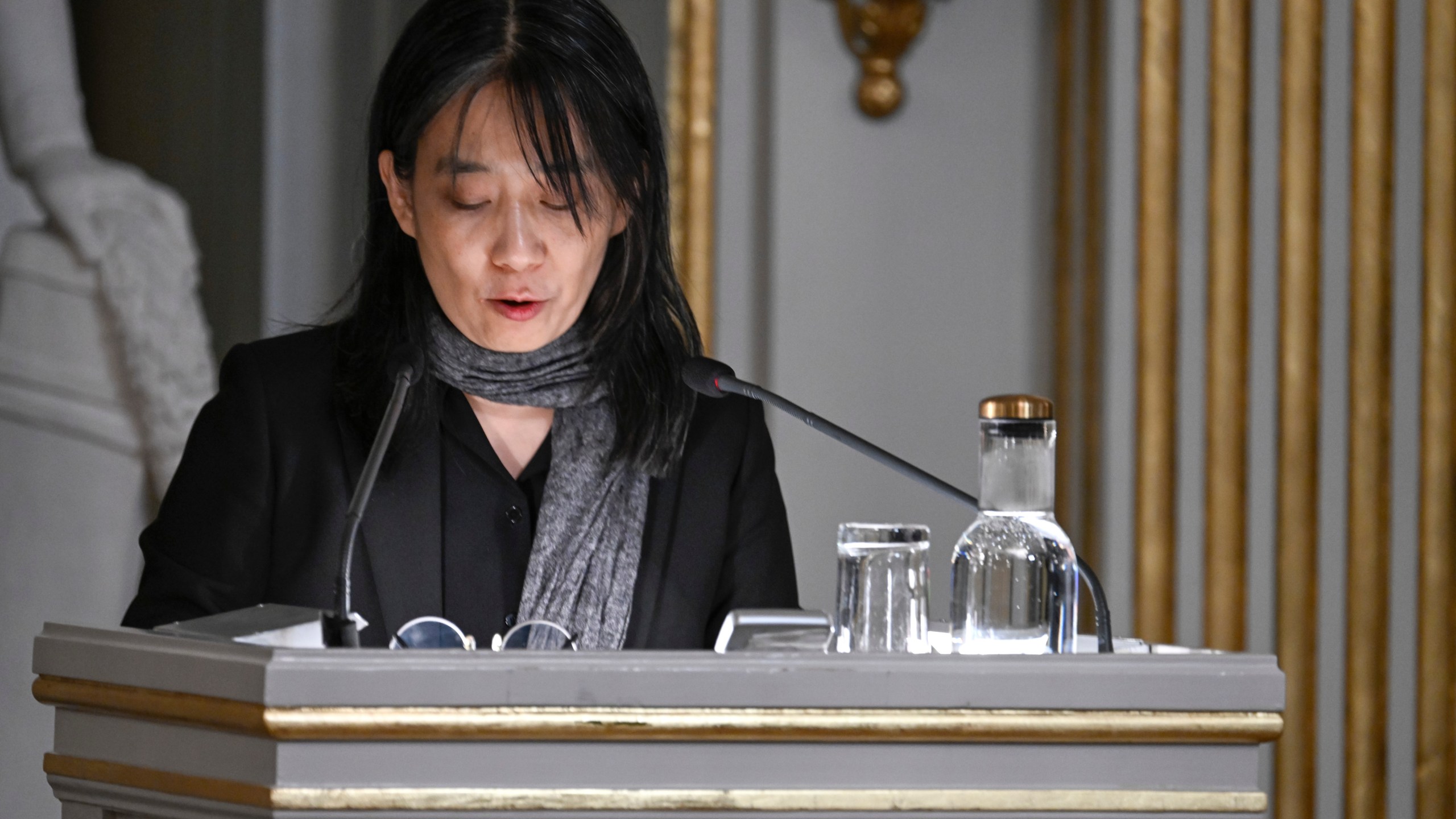 Nobel laureate in literature Han Kang speaks during this year's Nobel Prize lecture in literature at the Swedish Academy on Saturday, Dec. 7, 2024 in Stockholm, Sweden. (Pontus Lundahl/TT News Agency via AP)