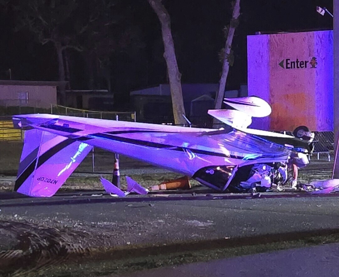 In this photo provided by the Florida Department of Highway Safety and Motor Vehicles, a single engine fixed-wing airplane lies upside down after it crashed on West White Dogwood Drive near the intersection of US-98 in Homosassa, Fla. on Friday evening, Dec. 6, 2024. (Florida Department of Highway Safety and Motor Vehicles via AP)