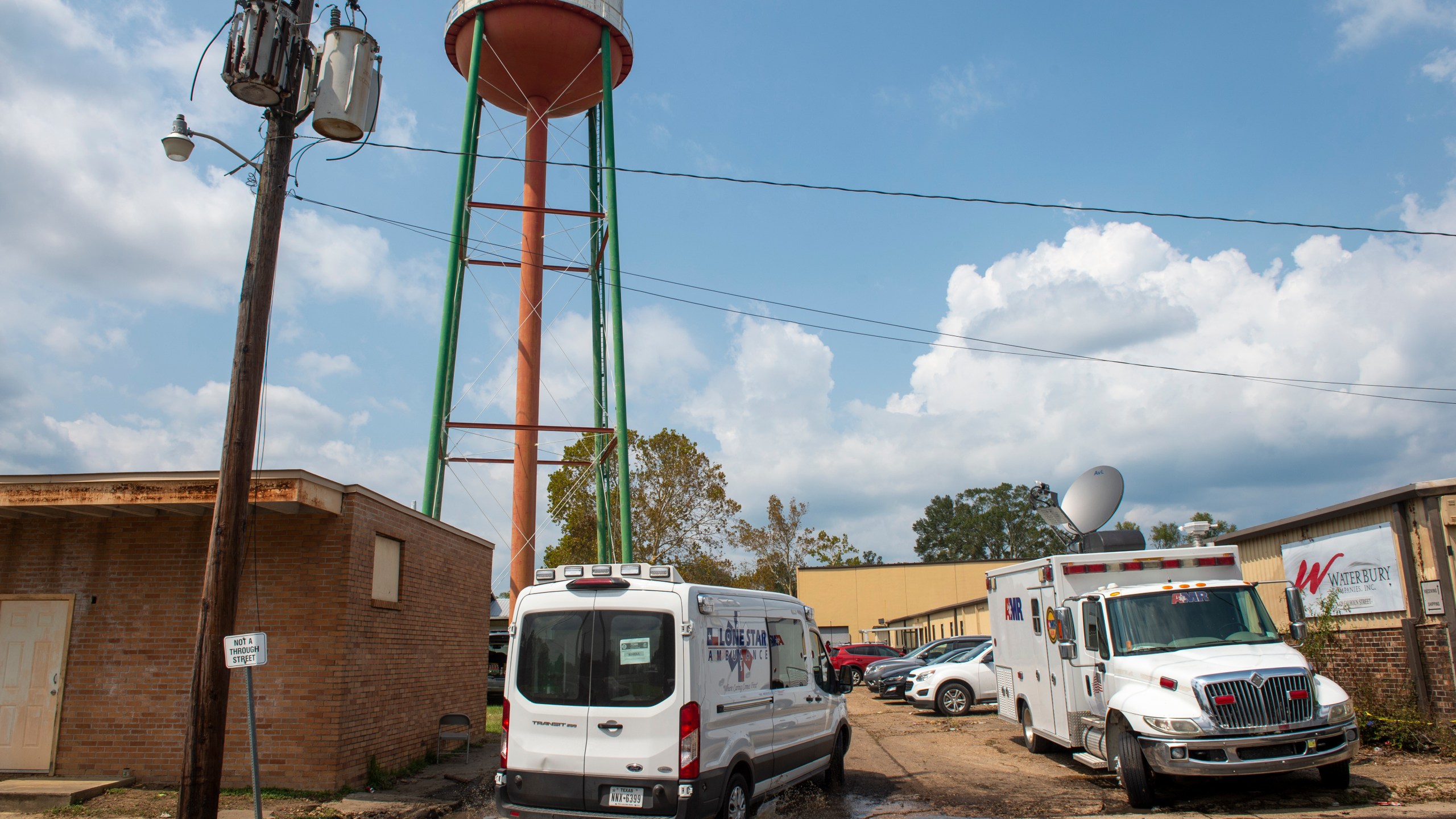 FILE - Emergency personnel arrive to evacuate people at a mass shelter, Sept. 2, 2021, in Independence, La. (Chris Granger/The New Orleans Advocate via AP, File)