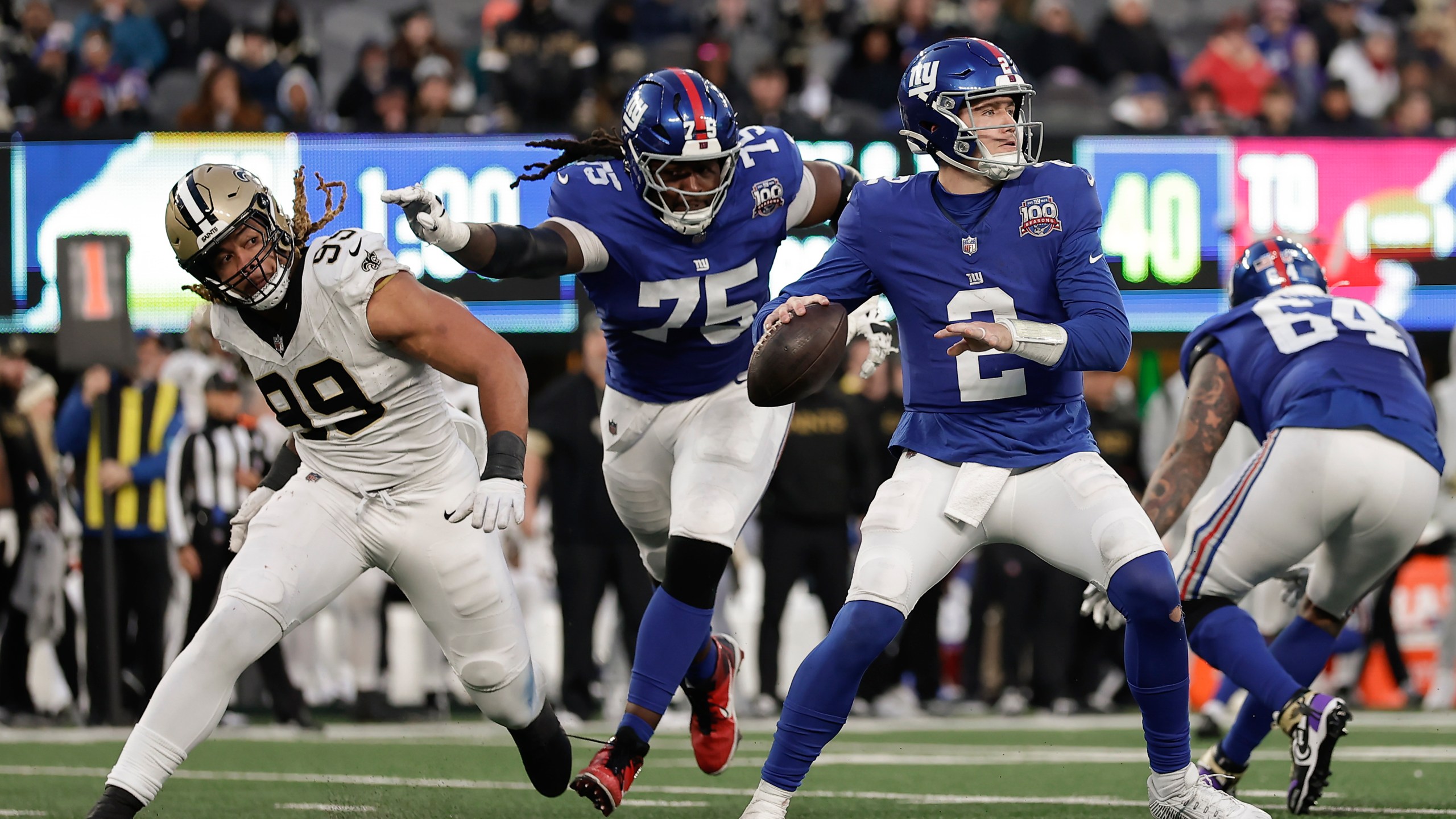 New York Giants quarterback Drew Lock (2) passes against the New Orleans Saints during the fourth quarter of an NFL football game, Sunday, Dec. 8, 2024, in East Rutherford, N.J. (AP Photo/Adam Hunger)