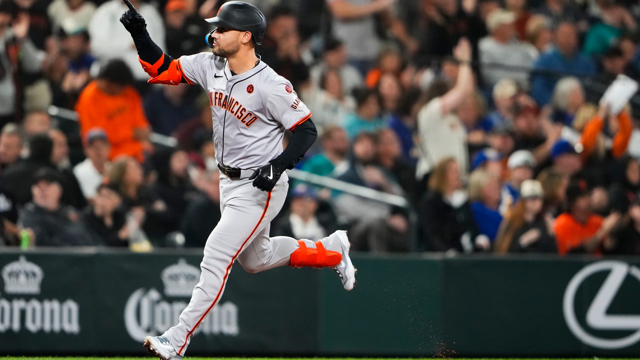 FILE - San Francisco Giants' Michael Conforto runs the bases after hitting a two-run home run to score Heliot Ramos against the Seattle Mariners during the fourth inning of a baseball game, Aug. 23, 2024, in Seattle. (AP Photo/Lindsey Wasson, File)