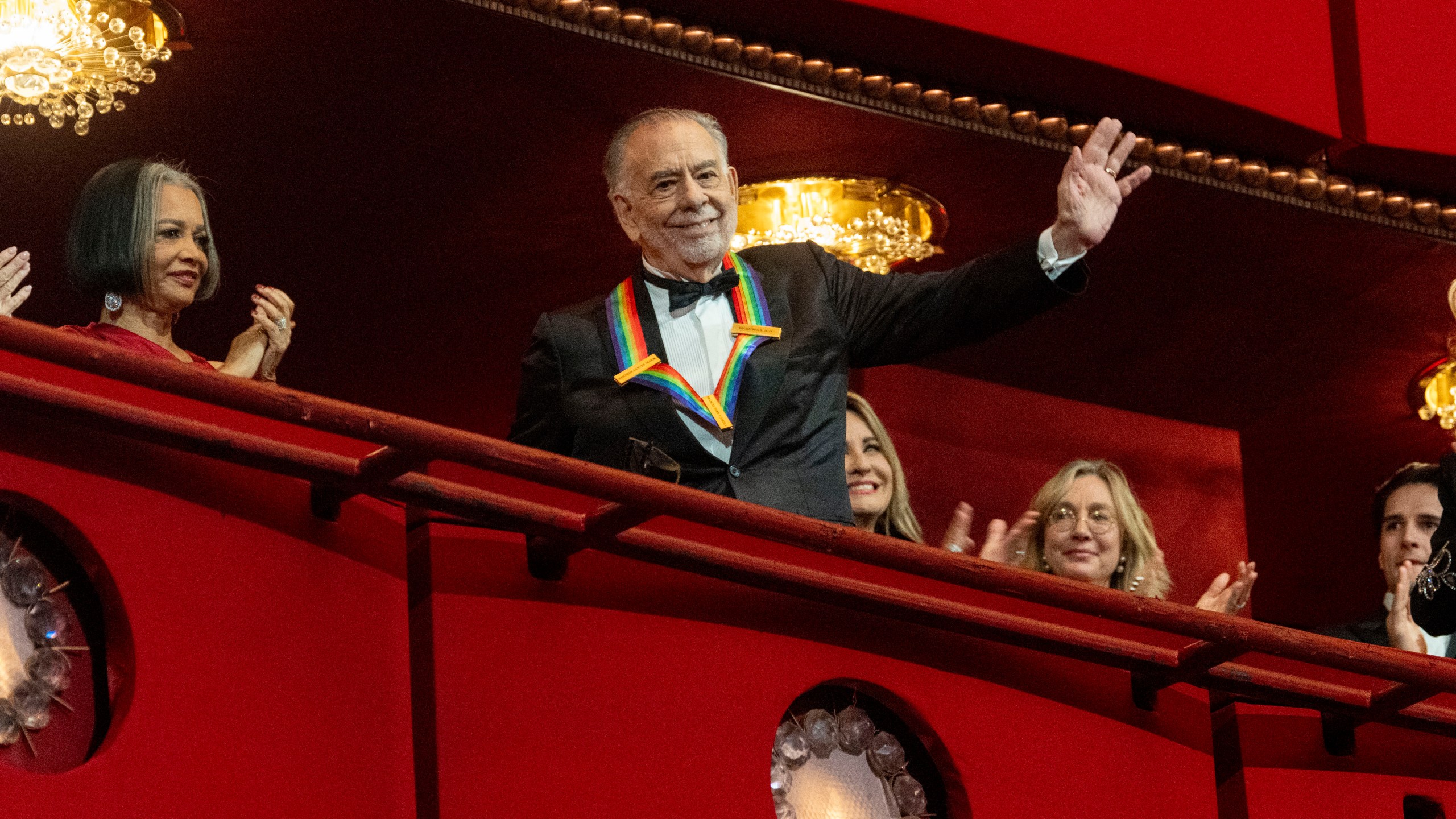 2024 Kennedy Center Honoree, director and filmmaker Francis Ford Coppola waves to the audience at the start of the Kennedy Center Honors Gala, Sunday, Dec. 8, 2024, in Washington. (AP Photo/Kevin Wolf)
