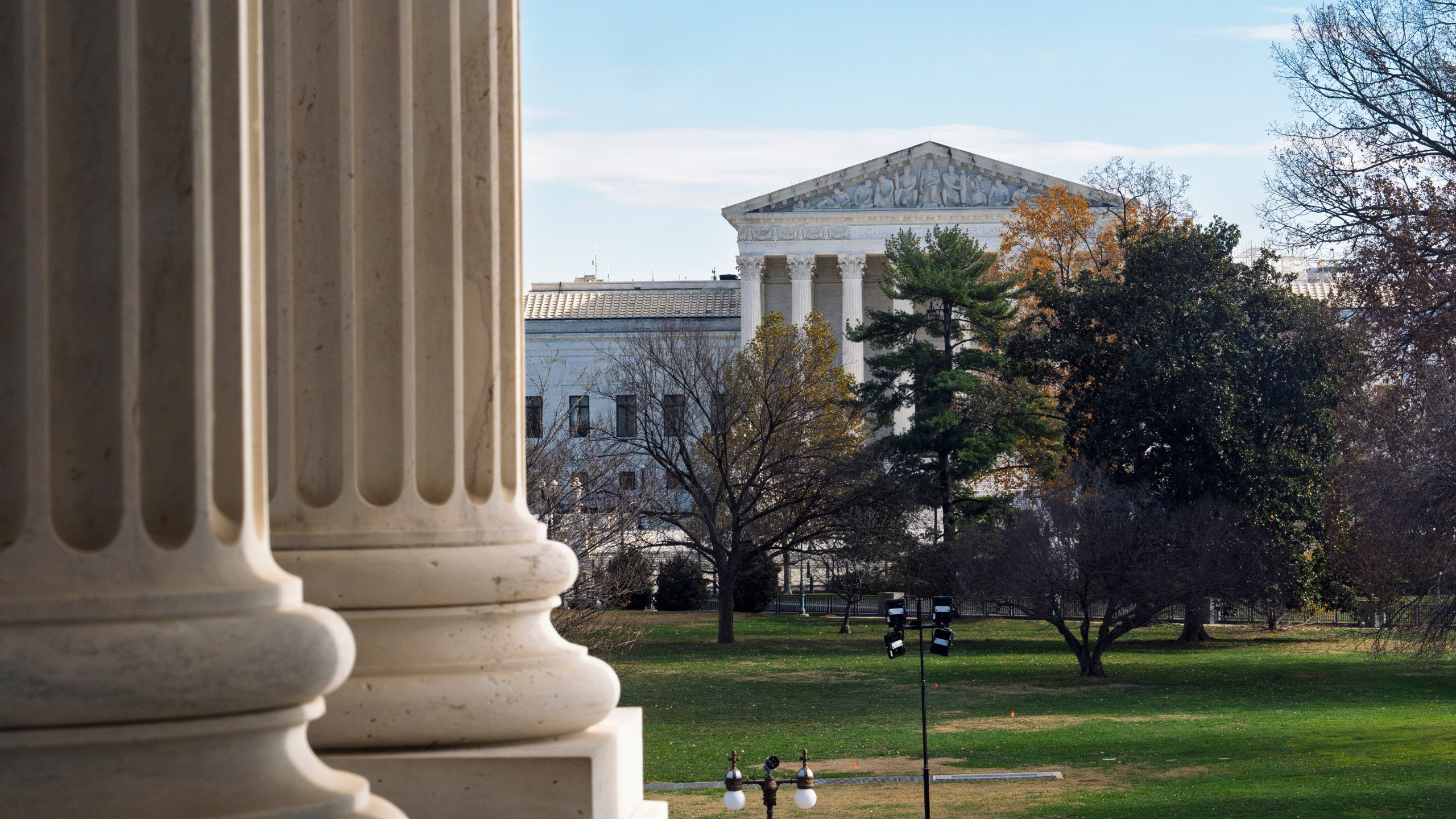 The Supreme Court is framed by the columns of the Capitol in Washington, Tuesday, Dec. 3, 2024. T (AP Photo/J. Scott Applewhite)