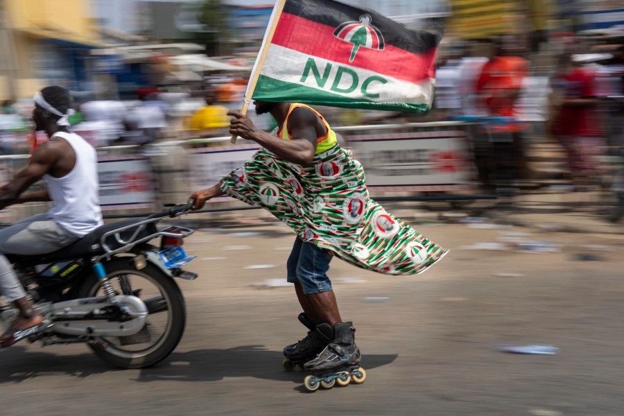 Supporters of opposition candidate and former President John Dramani Mahama celebrate his victory after his opponent conceded in Accra, Ghana, Sunday, Dec. 8, 2024. (AP Photo/Jerome Delay)