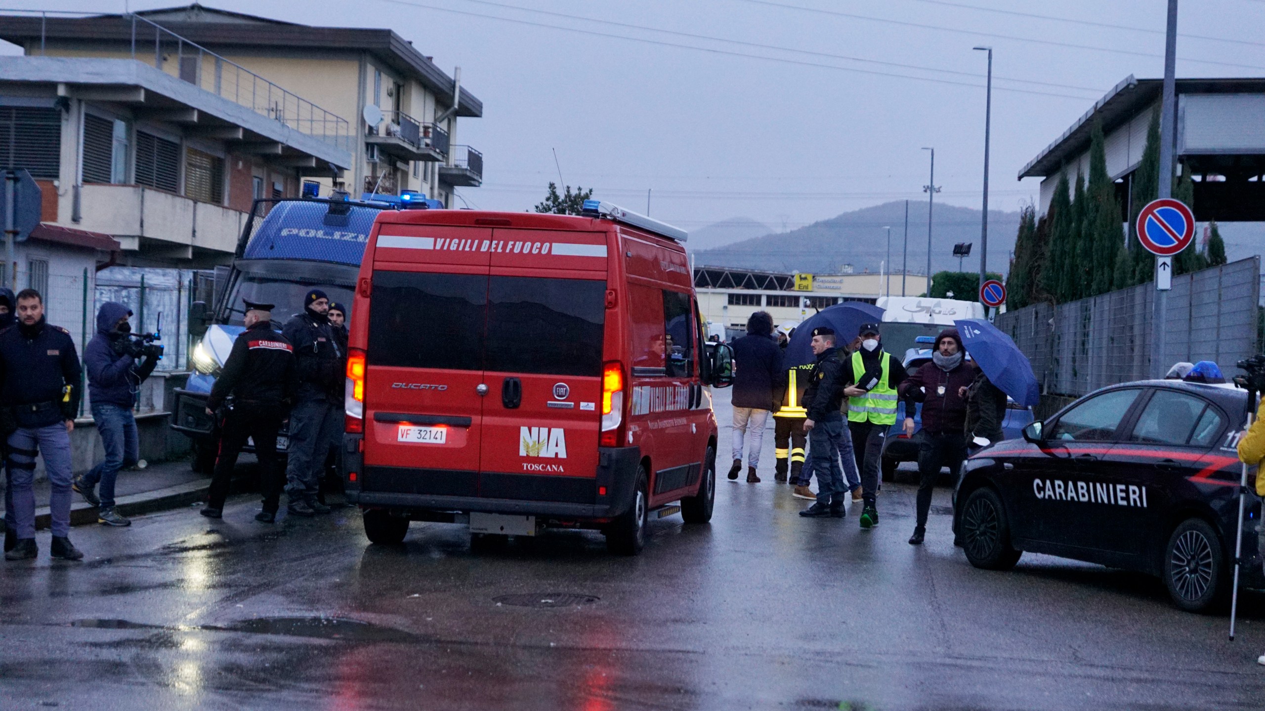 Emergency services work on a site of a fuel depot's explosion in Calenzano, near Florence, Italy, Monday, Dec. 9, 2024. (Alessandro La Rocca/LaPresse via AP)