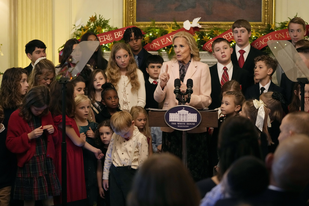First lady Jill Biden speaks during an event in the East Room of the White House in Washington, Monday, Dec. 2, 2024, to give her holiday message to the nation and to thank the volunteers who helped decorate the White House for the holiday season.