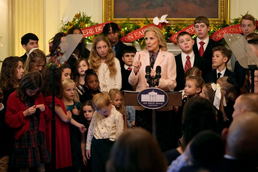 First lady Jill Biden speaks during an event in the East Room of the White House in Washington, Monday, Dec. 2, 2024, to give her holiday message to the nation and to thank the volunteers who helped decorate the White House for the holiday season.