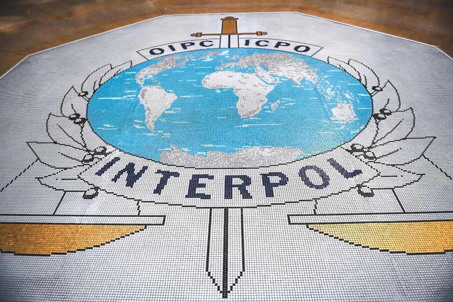 The logo of the International Criminal Police Organization, known as Interpol.