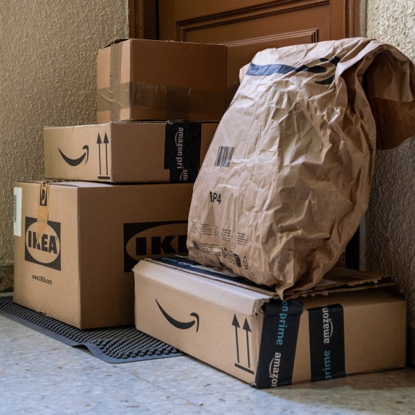 Online purchases from the retail companies in front of a customer's door.