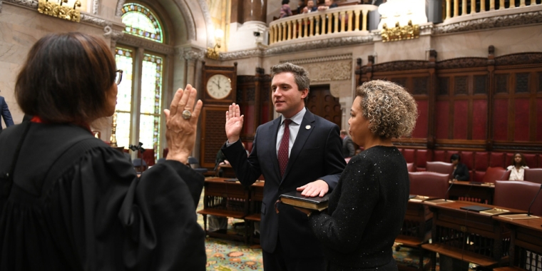New York State Sen. James Skoufis is sworn in for a third term in January 2023.